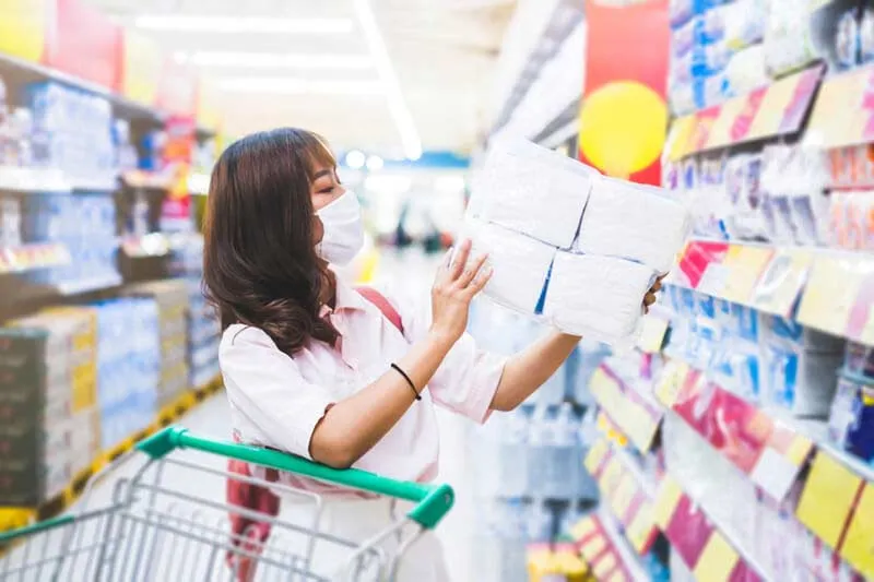 Empty store shelves during toilet paper shortage in pandemic