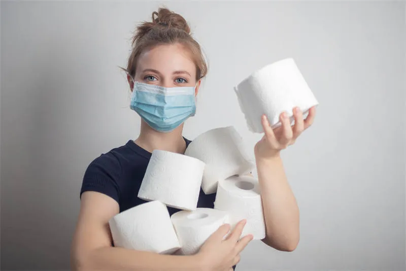 Premium toilet tissue paper rolls stacked neatly