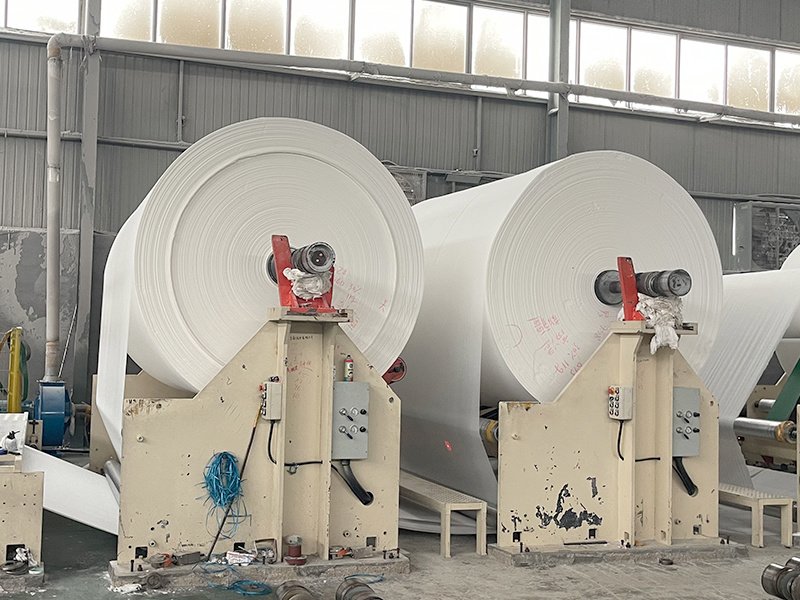 Mother jumbo roll face detail showing web density and edge quality