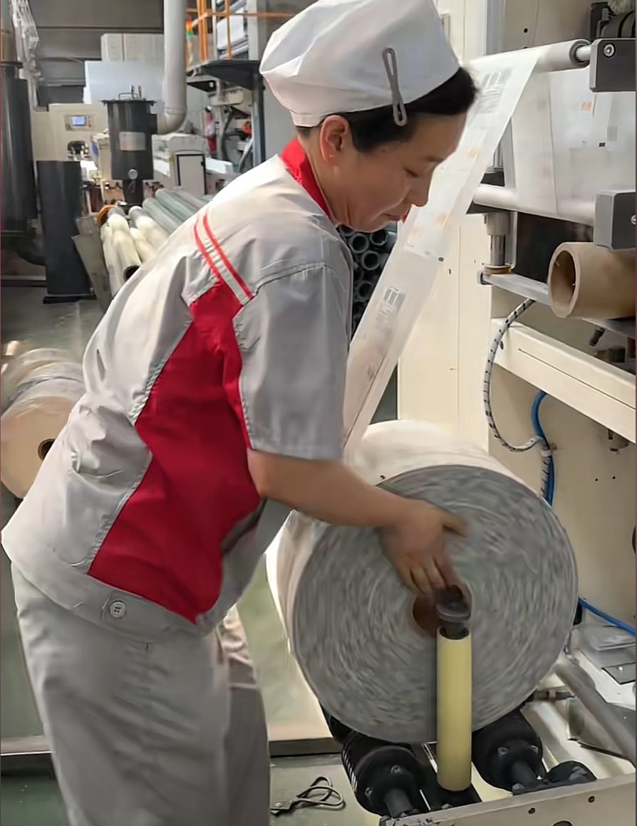 Virgin wood pulp parent rolls unwinding on tissue machine