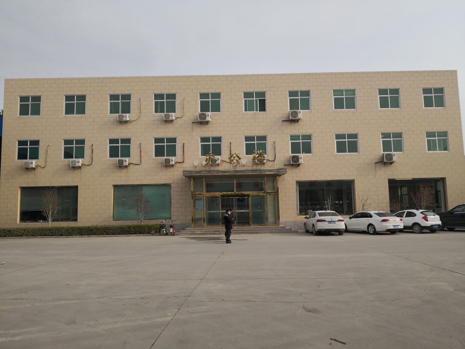 Top Source Paper factory floor showing quality control inspection station